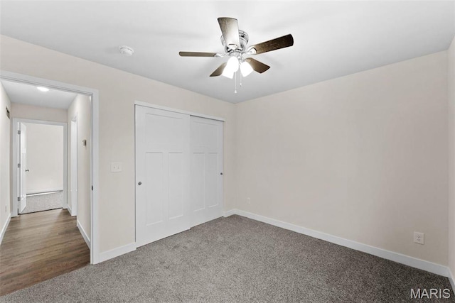 282 Railroad St, Moscow Mills, MO 63362 - unfurnished bedroom featuring carpet flooring, baseboards, a closet, and ceiling fan