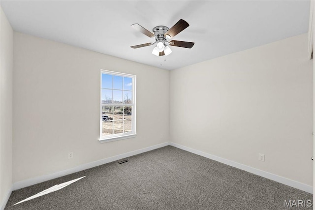 282 Railroad St, Moscow Mills, MO 63362 - empty room featuring carpet, baseboards, and ceiling fan
