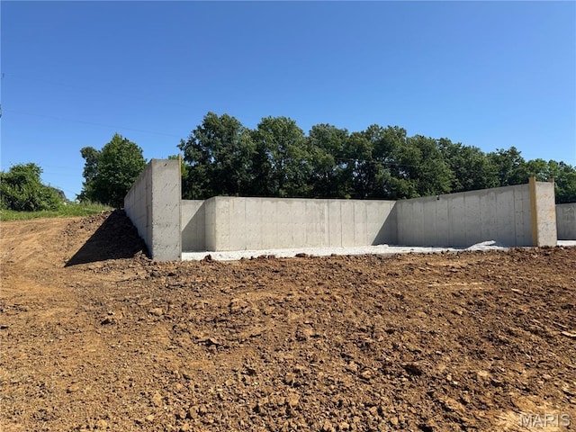 282 Railroad St, Moscow Mills, MO 63362 - view of storm shelter with fence