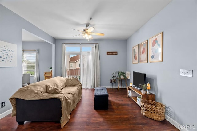 1239 Gardens Circle Dr Unit I, Saint Louis, MO 63125 - living room featuring a ceiling fan, healthy amount of natural light, baseboards, and wood finished floors