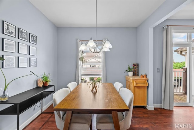 1239 Gardens Circle Dr Unit I, Saint Louis, MO 63125 - dining area with a chandelier, dark wood finished floors, and baseboards
