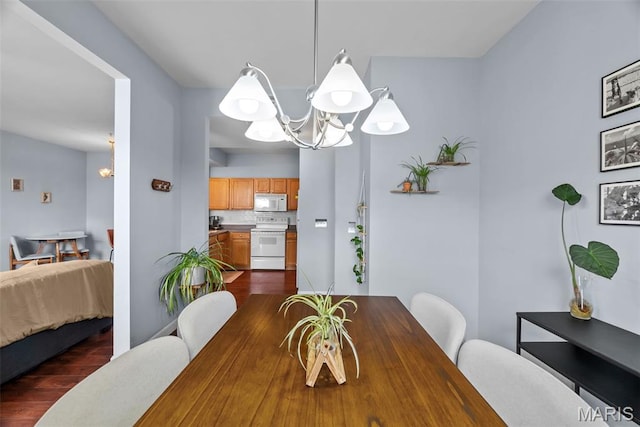 1239 Gardens Circle Dr Unit I, Saint Louis, MO 63125 - dining room with a chandelier and dark wood-type flooring