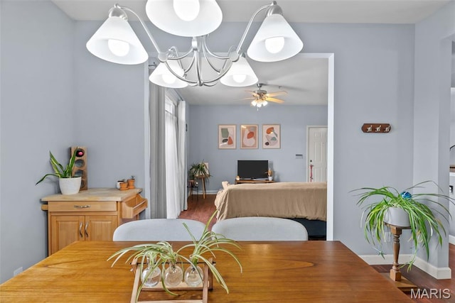 1239 Gardens Circle Dr Unit I, Saint Louis, MO 63125 - dining space featuring a chandelier, wood finished floors, ceiling fan, and baseboards