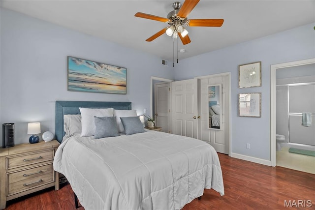 1239 Gardens Circle Dr Unit I, Saint Louis, MO 63125 - bedroom with dark wood finished floors, baseboards, connected bathroom, and a ceiling fan