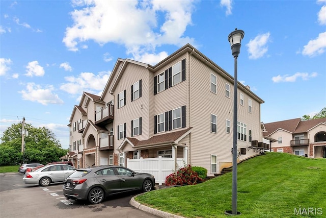 1239 Gardens Circle Dr Unit I, Saint Louis, MO 63125 - view of property with uncovered parking