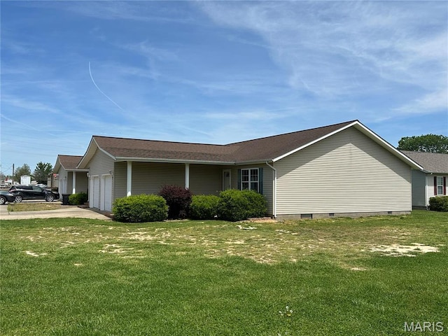 2 One Mile Rd Unit 2-4-6-8, Dexter, MO 63841 - view of side of property with a garage, a lawn, and driveway