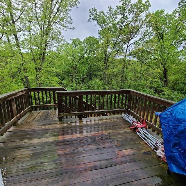 8 Nathan St, Waynesville, MO 65583 - wooden terrace featuring a forest view
