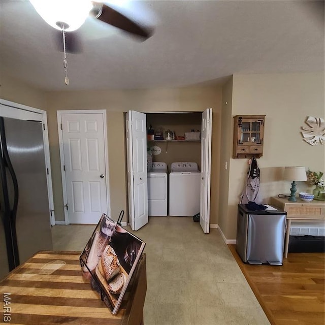 8 Nathan St, Waynesville, MO 65583 - kitchen featuring stainless steel fridge, washer and clothes dryer, ceiling fan, and baseboards