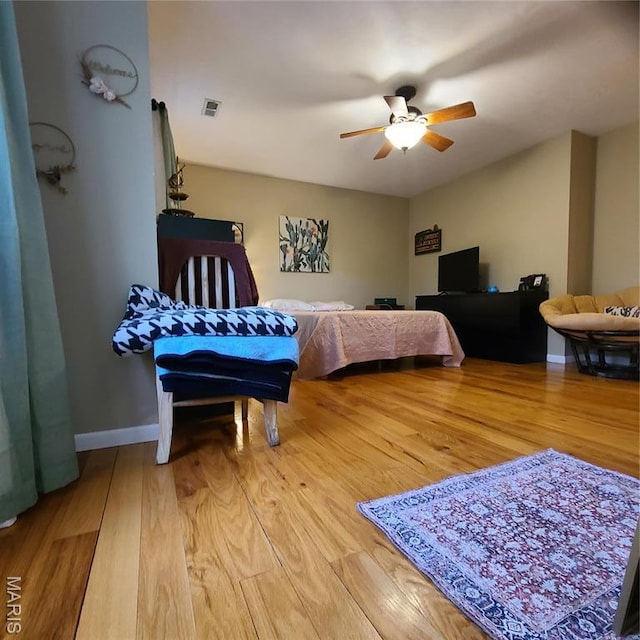 8 Nathan St, Waynesville, MO 65583 - bedroom featuring light wood-type flooring, a ceiling fan, and baseboards