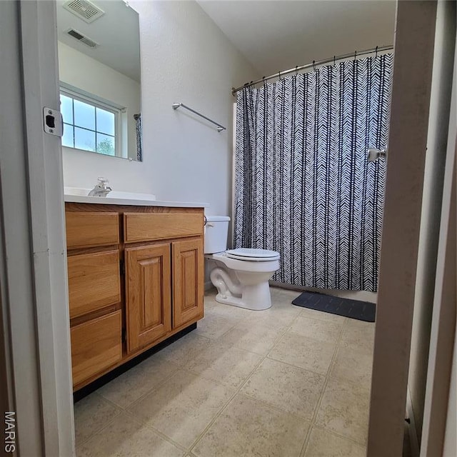 8 Nathan St, Waynesville, MO 65583 - bathroom featuring toilet, vanity, and a shower with curtain