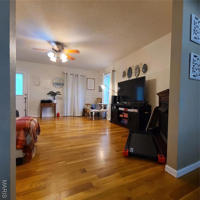 8 Nathan St, Waynesville, MO 65583 - living room featuring ceiling fan and light wood-type flooring