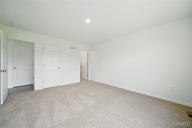 114 Harrow Dr, Ofallon, MO 63385 - unfurnished bedroom featuring baseboards and carpet floors