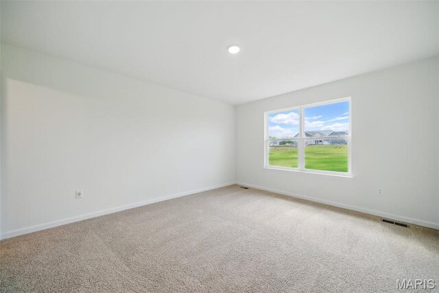 114 Harrow Dr, Ofallon, MO 63385 - spare room with baseboards and carpet floors