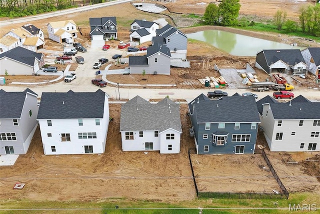 114 Harrow Dr, Ofallon, MO 63385 - aerial perspective of suburban area with a nearby body of water