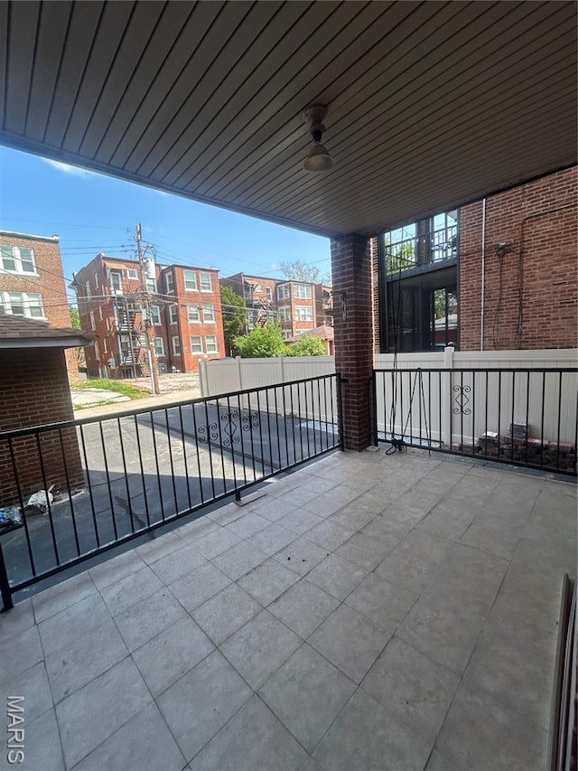 740 Heman Ave, Saint Louis, MO 63130 - view of patio / terrace featuring a balcony and ceiling fan