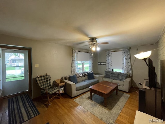 308 S Cedar St, Trenton, IL 62293 - living area featuring light wood finished floors and a ceiling fan