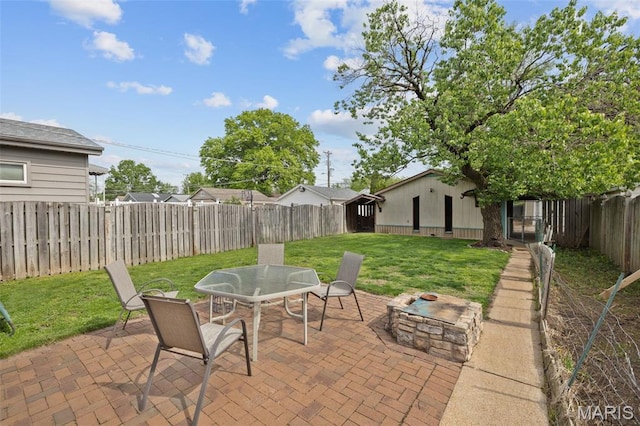 5245 Robert Ave, Saint Louis, MO 63109 - view of patio / terrace with an outdoor fire pit