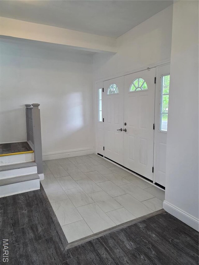 5614 Etzel Ave, Saint Louis, MO 63112 - foyer entrance featuring baseboards and marble finish flooring