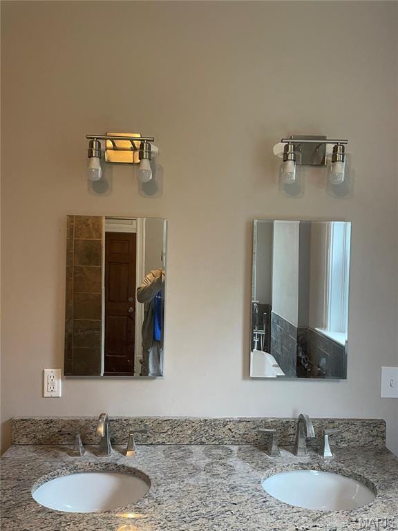 5614 Etzel Ave, Saint Louis, MO 63112 - bathroom featuring double vanity