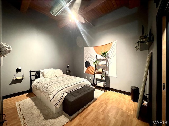 1113 Washington Ave Unit 312, Saint Louis, MO 63101 - bedroom featuring baseboards, wood finished floors, and a ceiling fan