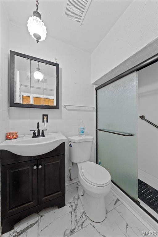 11151 Whispering Oaks Dr, Saint Louis, MO 63136 - bathroom with vanity, toilet, a stall shower, and marble look tiles
