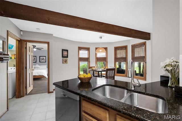 108 Antoinette Ter, Lake St Louis, MO 63367 - kitchen with a sink, dishwasher, beam ceiling, dark stone counters, and washer / clothes dryer