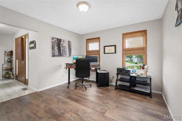 108 Antoinette Ter, Lake St Louis, MO 63367 - home office featuring wood finished floors and baseboards
