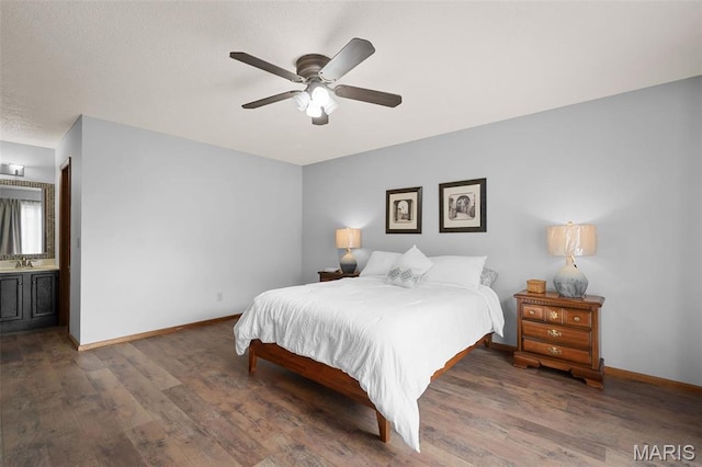 108 Antoinette Ter, Lake St Louis, MO 63367 - bedroom with a sink, wood finished floors, baseboards, and a ceiling fan