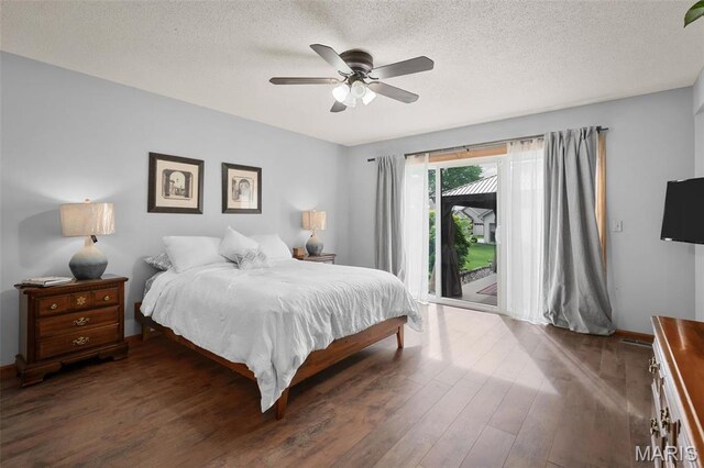 108 Antoinette Ter, Lake St Louis, MO 63367 - bedroom featuring access to exterior, wood finished floors, a textured ceiling, a ceiling fan, and baseboards