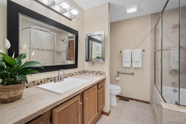 108 Antoinette Ter, Lake St Louis, MO 63367 - bathroom featuring toilet, vanity, tile patterned floors, baseboards, and combined bath / shower with glass door
