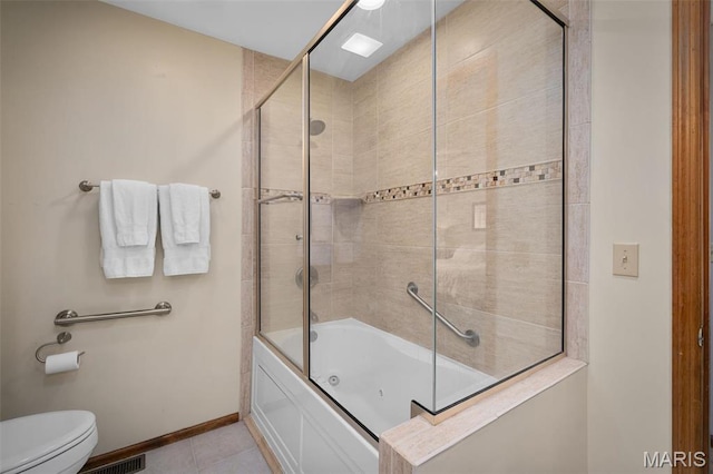 108 Antoinette Ter, Lake St Louis, MO 63367 - full bath with tile patterned flooring, toilet, bath / shower combo with glass door, and baseboards