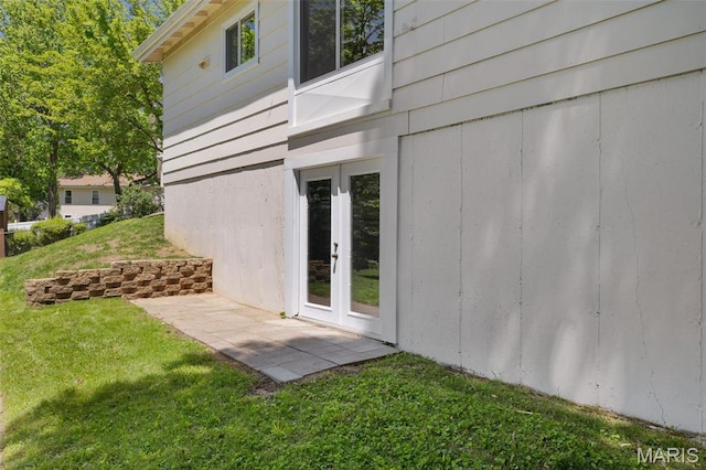 1200 Auber Dr, Manchester, MO 63011 - view of property exterior with a lawn and french doors