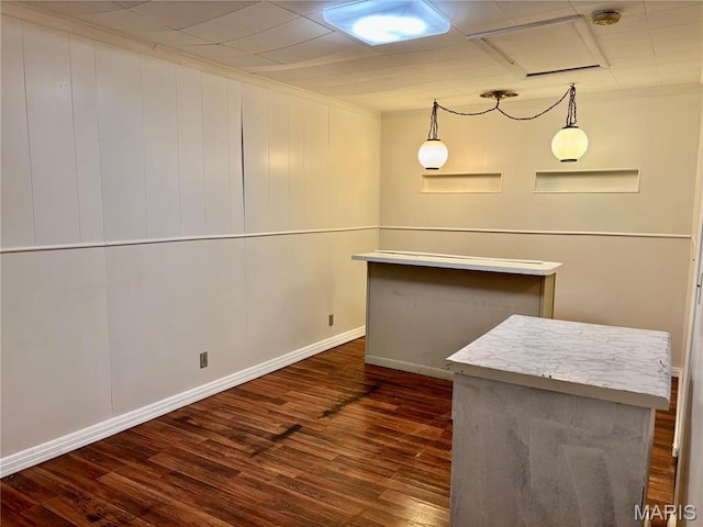 213 Todd Ln, Belleville, IL 62221 - kitchen with dark wood-style floors, a kitchen island, baseboards, hanging light fixtures, and ornamental molding