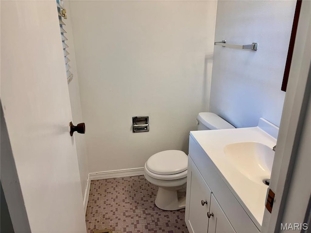 213 Todd Ln, Belleville, IL 62221 - bathroom with toilet, vanity, baseboards, and tile patterned floors
