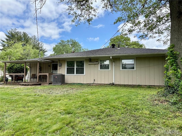 213 Todd Ln, Belleville, IL 62221 - rear view of property featuring a deck, a lawn, and central AC