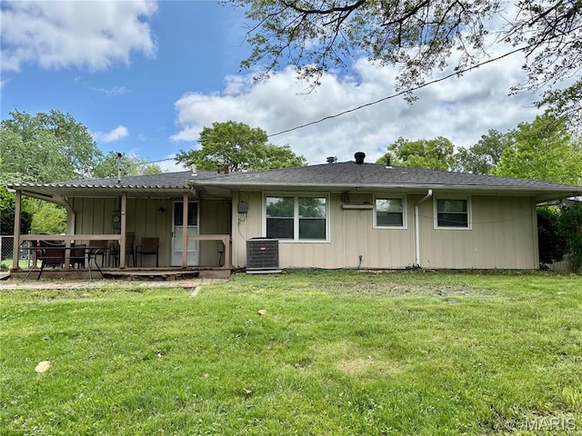 213 Todd Ln, Belleville, IL 62221 - rear view of house with a lawn, central AC, and a wooden deck