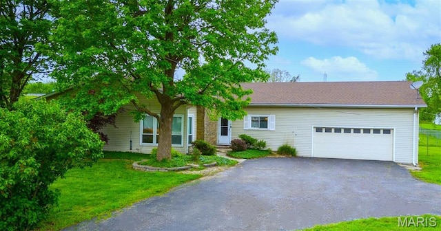 4241 State Route 162, Granite City, IL 62040 - single story home featuring asphalt driveway, an attached garage, and a front lawn
