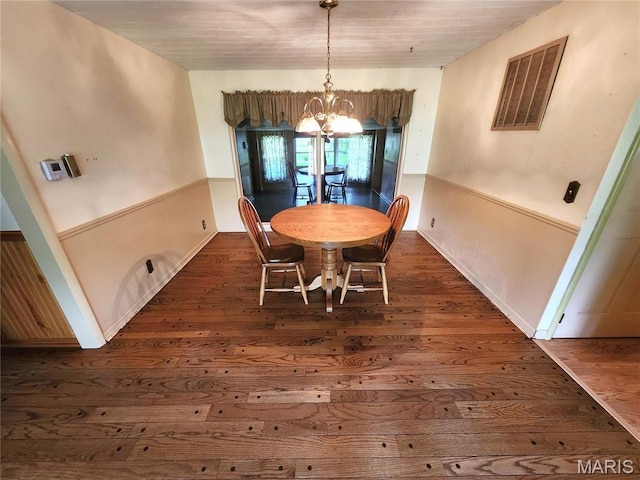 4241 State Route 162, Granite City, IL 62040 - dining space featuring a chandelier and dark wood-style flooring