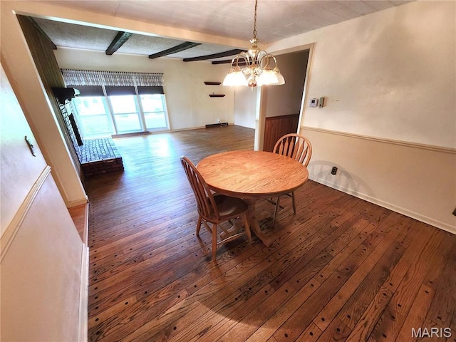 4241 State Route 162, Granite City, IL 62040 - dining space featuring wood-type flooring, beam ceiling, a chandelier, and baseboards