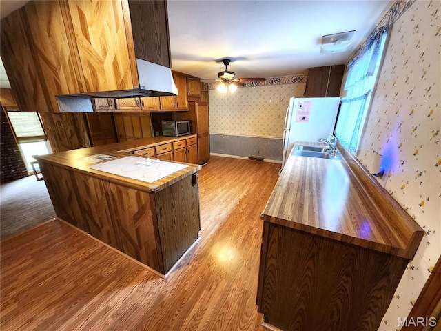 4241 State Route 162, Granite City, IL 62040 - kitchen featuring white appliances, wallpapered walls, light wood-type flooring, plenty of natural light, and ceiling fan