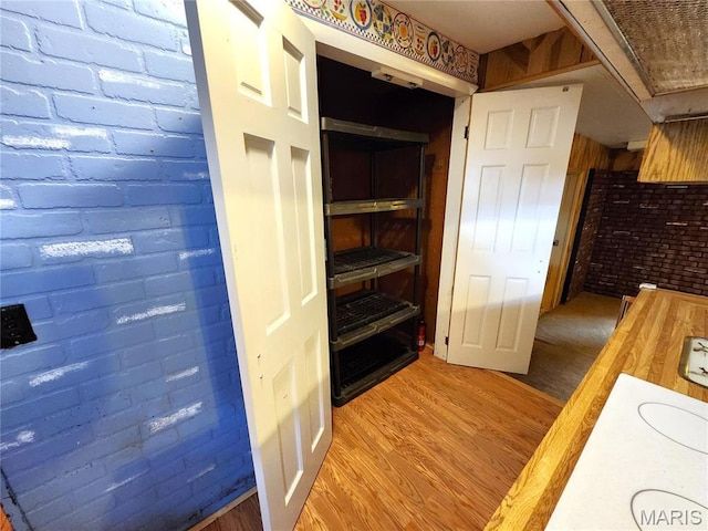 4241 State Route 162, Granite City, IL 62040 - hallway with brick wall and light wood finished floors