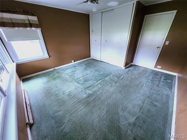 4241 State Route 162, Granite City, IL 62040 - unfurnished bedroom featuring carpet flooring, baseboards, a closet, and crown molding