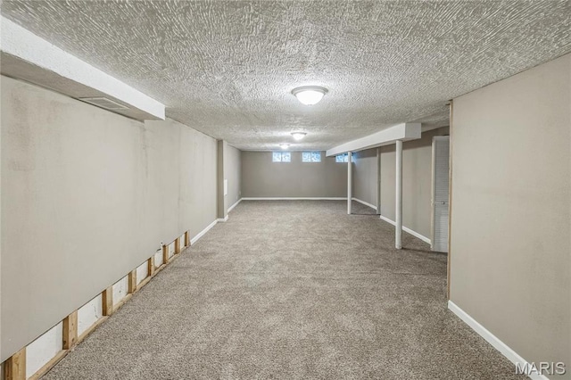 6363 Coventry Dr, Florissant, MO 63033 - below grade area featuring carpet flooring and baseboards