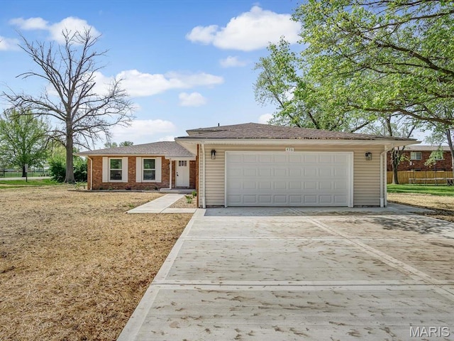 496 E 2nd St, Trenton, IL 62293 - ranch-style house featuring driveway and brick siding