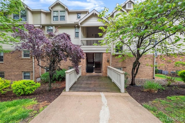 12944 Bryce Canyon Dr, Maryland Heights, MO 63043 - view of front of home featuring a balcony and brick siding