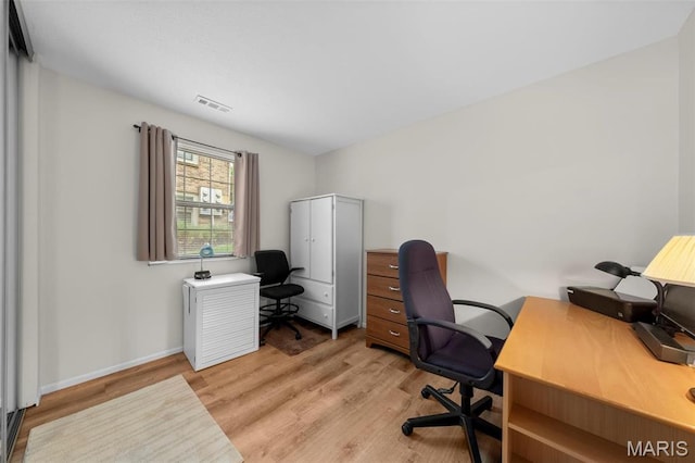 12944 Bryce Canyon Dr, Maryland Heights, MO 63043 - office area featuring light wood-type flooring and baseboards