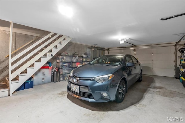 38 Trailside Ct Unit 3, Saint Charles, MO 63303 - garage featuring a garage door opener