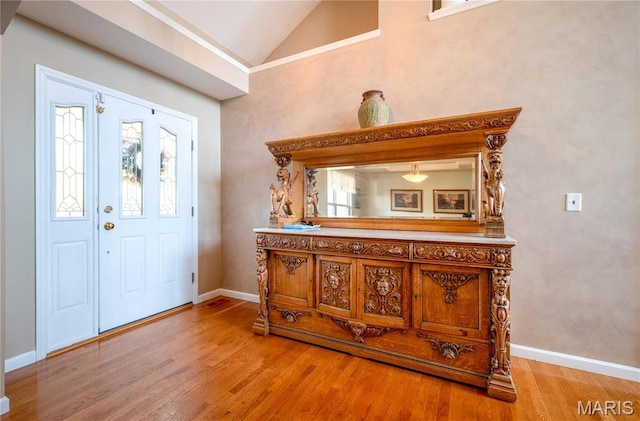 1004 Kodiak Ct, Wentzville, MO 63385 - entrance foyer with wood finished floors, lofted ceiling, and healthy amount of natural light