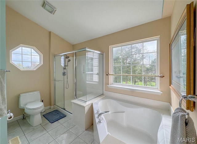 1004 Kodiak Ct, Wentzville, MO 63385 - bathroom with plenty of natural light, a shower stall, a bath, and tile patterned floors