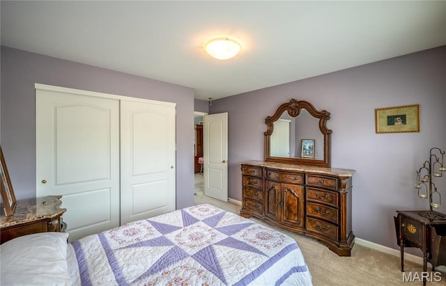1004 Kodiak Ct, Wentzville, MO 63385 - bedroom featuring light carpet and a closet